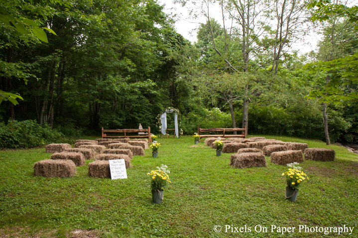 Wedding aisle details and daisies at outdoor country mountain wedding at big red barn in west jefferson nc photo