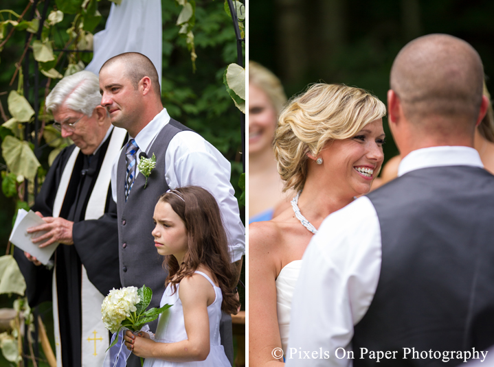 Bride and groom wedding ceremony vows at outdoor country mountain wedding at big red barn in west jefferson nc photo