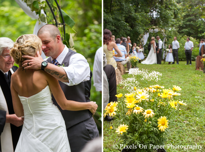 Bride and groom wedding ceremony vows at outdoor country mountain wedding at big red barn in west jefferson nc photo