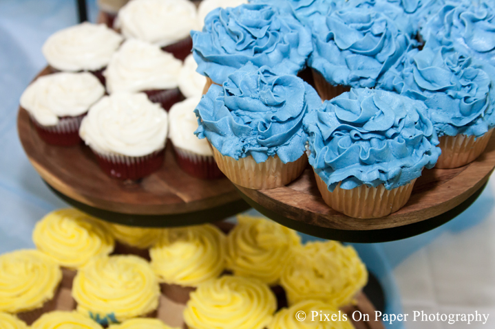 blue, yellow, and white wedding cupcakes photo