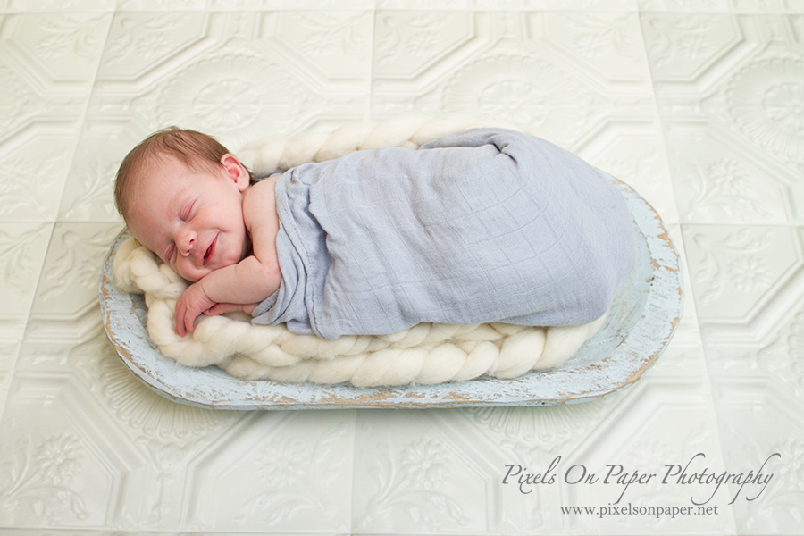 Newborn baby photographer. Holden sleeping during photo session with Pixels On Paper Photography