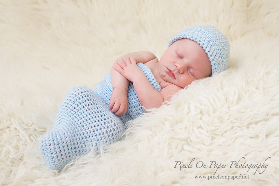 Newborn baby photographer. Holden sleeping during photo session with Pixels On Paper Photography