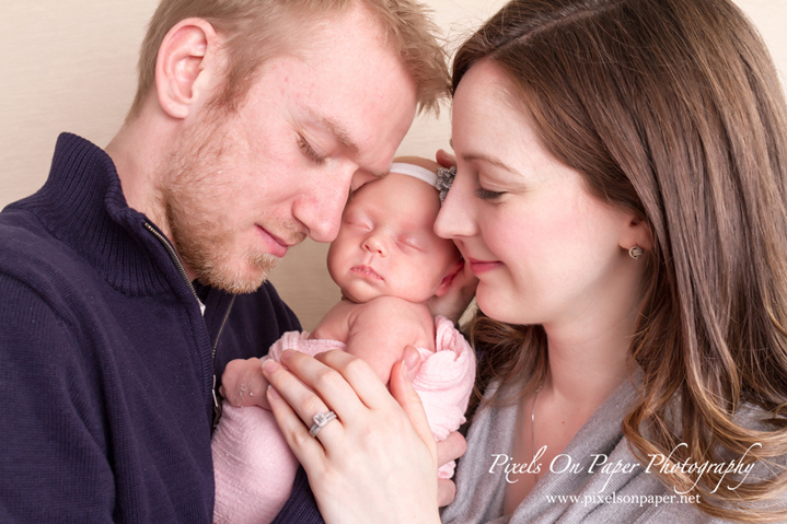 Pixels on Paper photographs newborn session with Arnolds photos