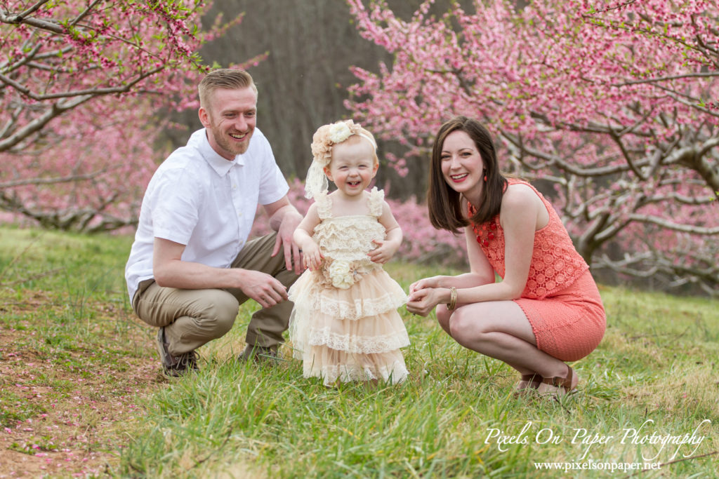 Arnold family outdoor spring peach orchard photos by Pixels On Paper Portrait Photographers photo