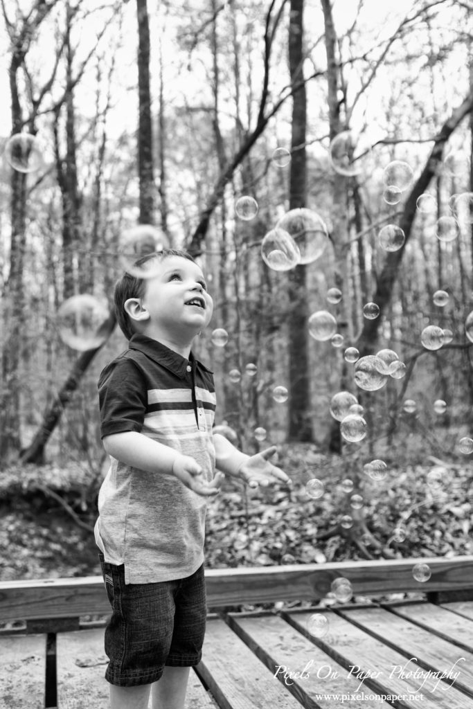 pixels on paper photographers two year old boy outdoor portrait photo