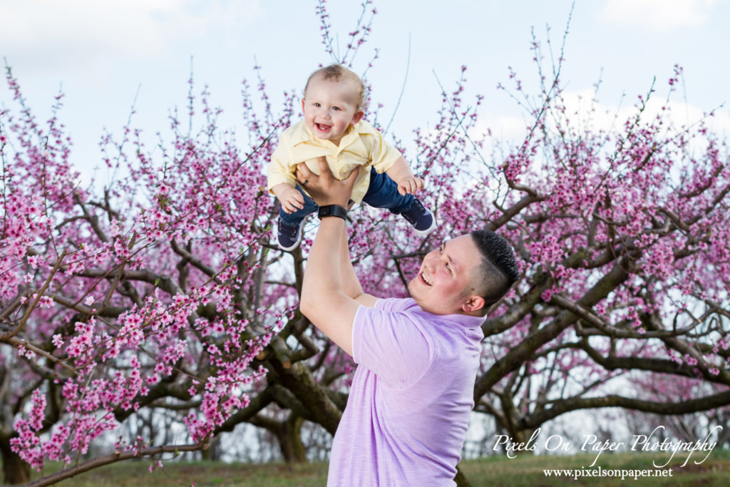 Orozco family outdoor peach orchard portrait baby announcement photo