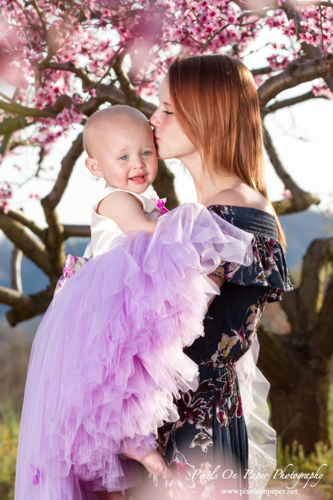 Pixels On Paper Photographers Driver family outdoor spring peach orchard wilkesboro nc portrait photo