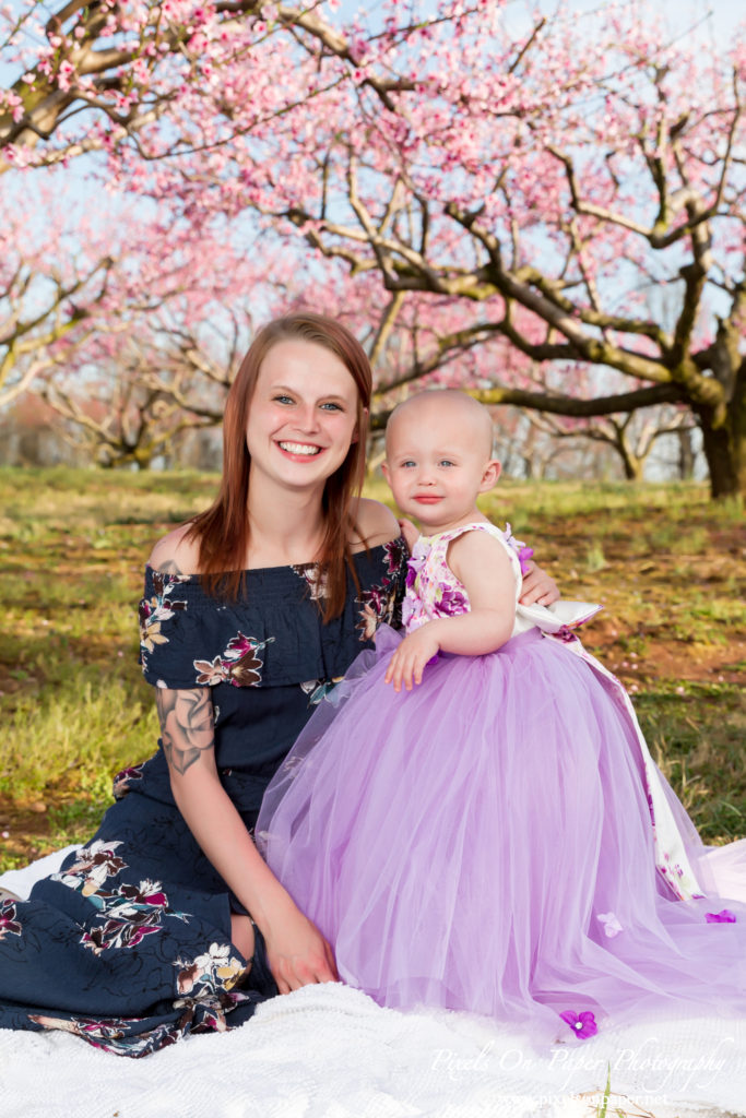 Pixels On Paper Photographers Driver family outdoor spring peach orchard wilkesboro nc portrait photo