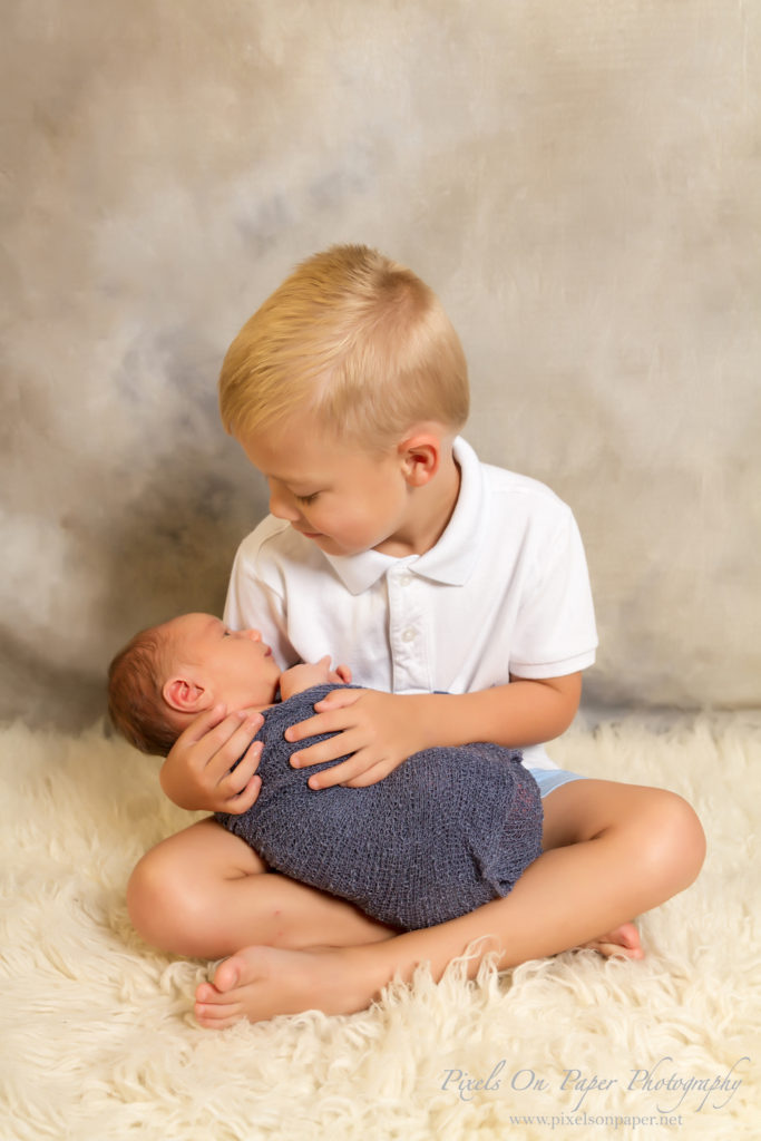 Luka Becerra newborn pixels on paper wilkesboro nc family portrait photographers photo