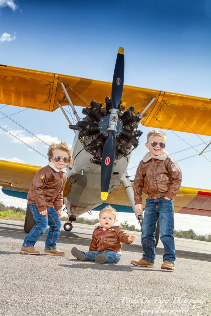 Pierce One Year Portraits cake smash airplane by Pixels On Paper Portrait Photographers