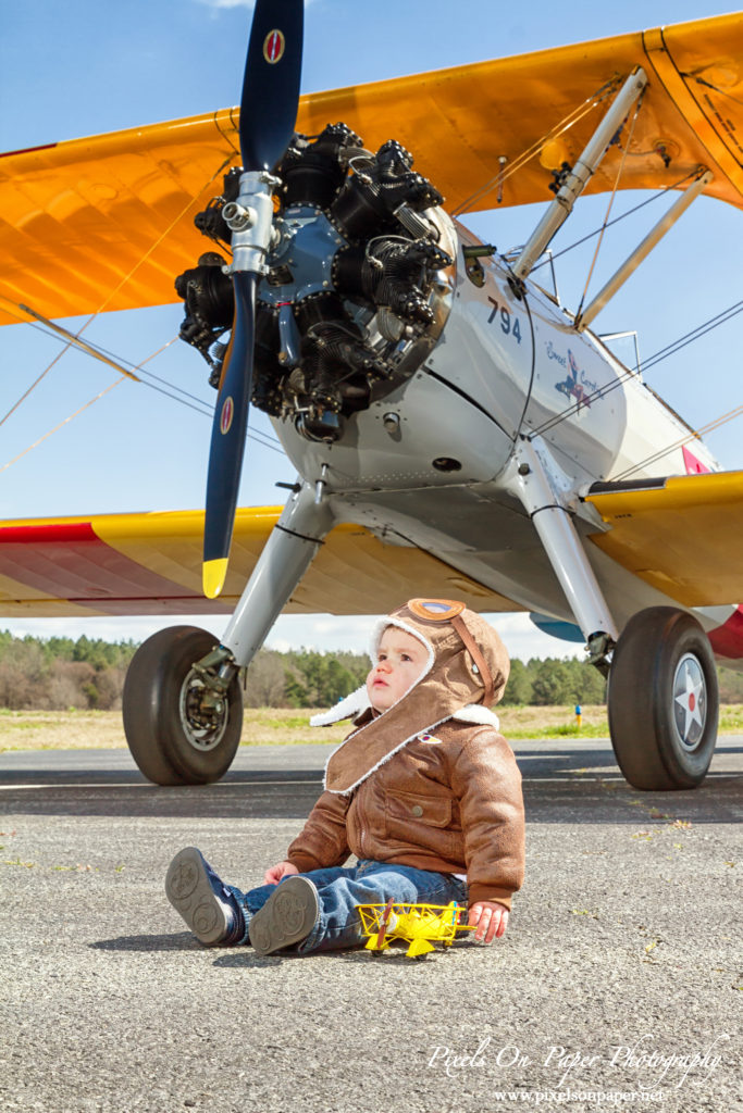 Pierce One Year Portraits cake smash airplane by Pixels On Paper Portrait Photographers