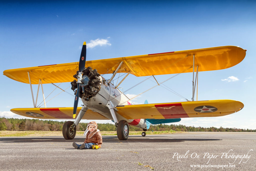 Pierce One Year Portraits cake smash airplane by Pixels On Paper Portrait Photographers