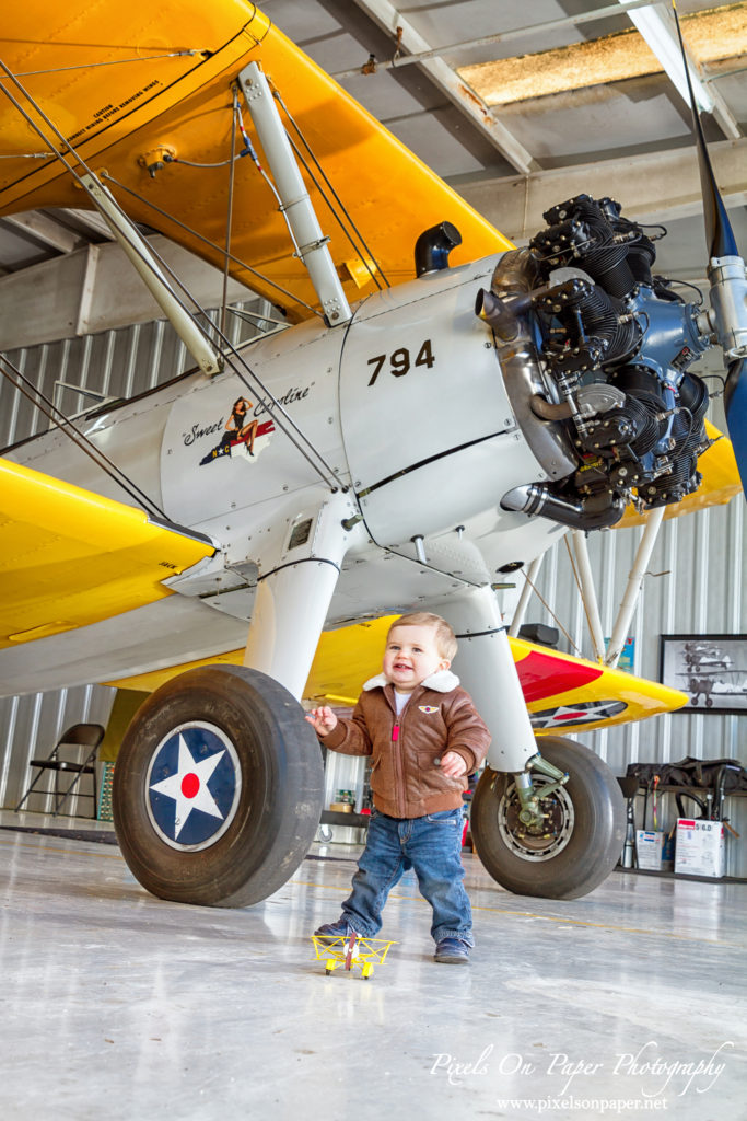 Pierce One Year Portraits cake smash airplane by Pixels On Paper Portrait Photographers