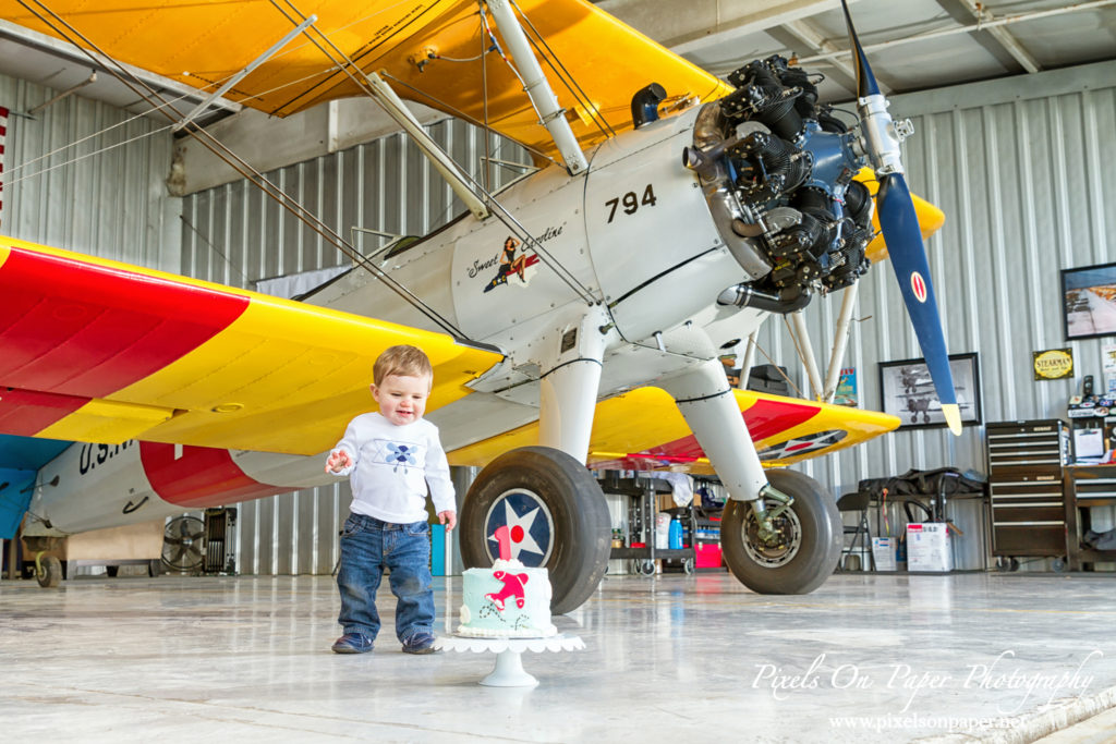 Pierce One Year Portraits cake smash airplane by Pixels On Paper Portrait Photographers