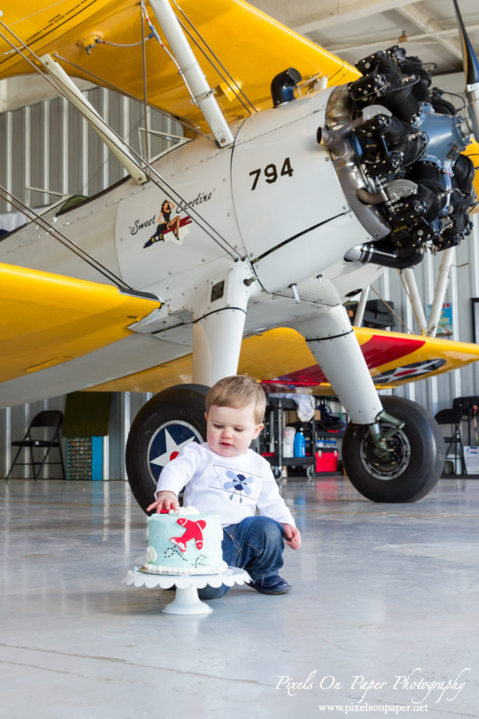 Pierce One Year Portraits cake smash airplane by Pixels On Paper Portrait Photographers