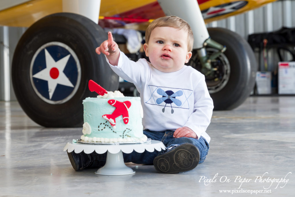 Pierce One Year Portraits cake smash airplane by Pixels On Paper Portrait Photographers