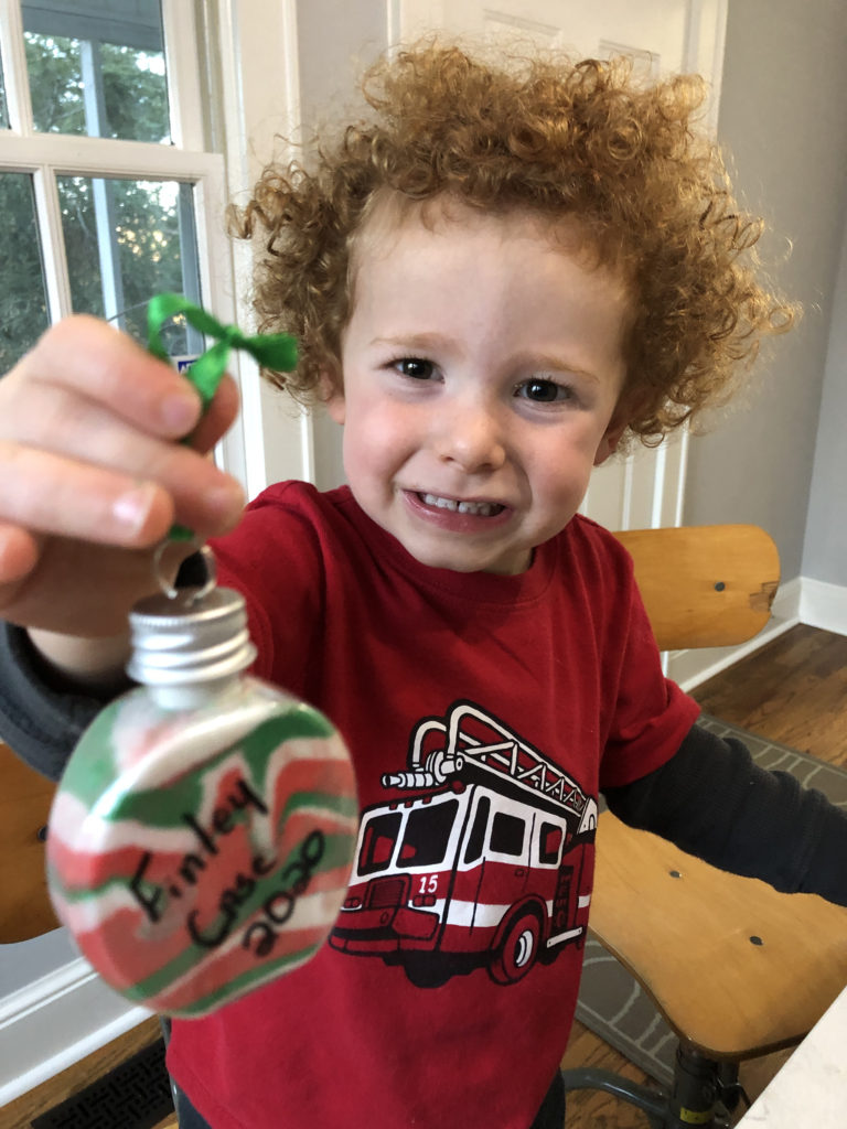 Finley making Christmas ornaments photo