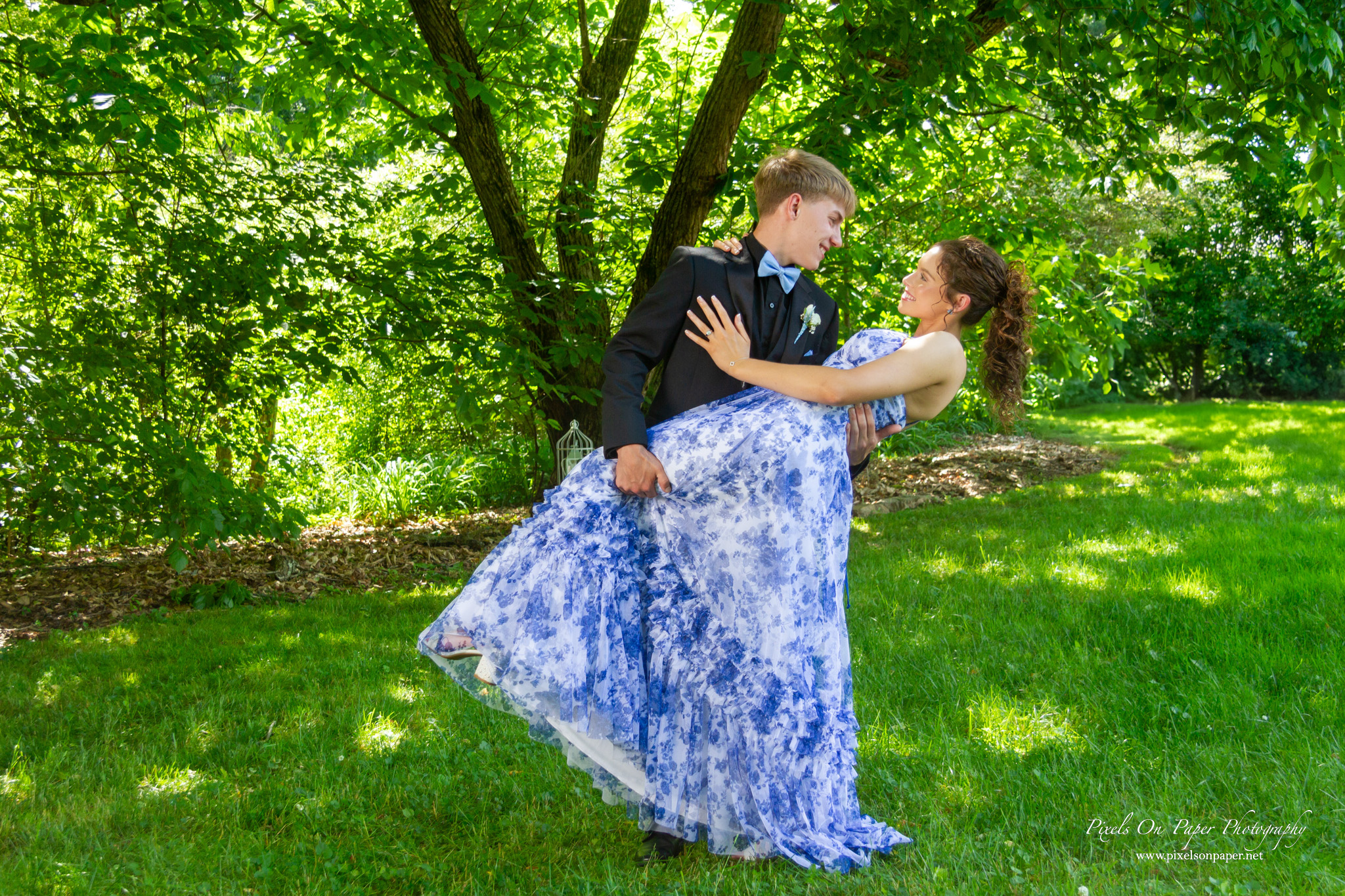 Colton and Aubrianna of West Wilkes High School captured during golden hour at their prom portrait session by Pixels On Paper Photography.