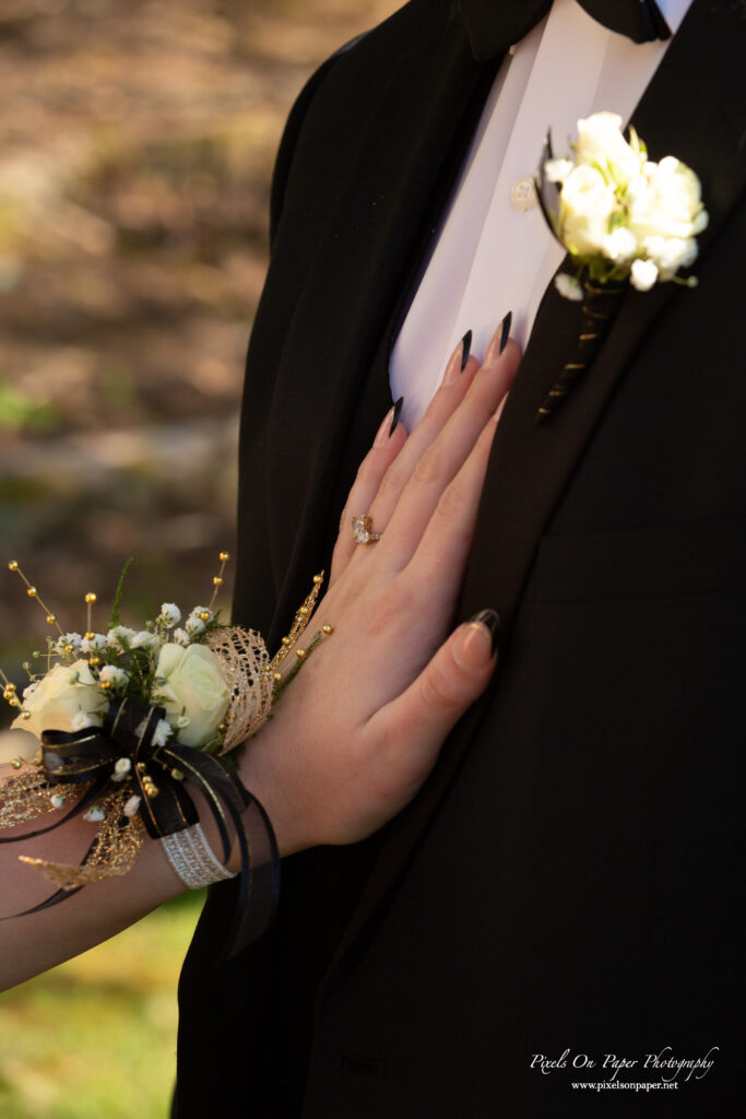 Close-up of corsage and formalwear details from Valek and Sailym’s Wilkes Central High School prom session.