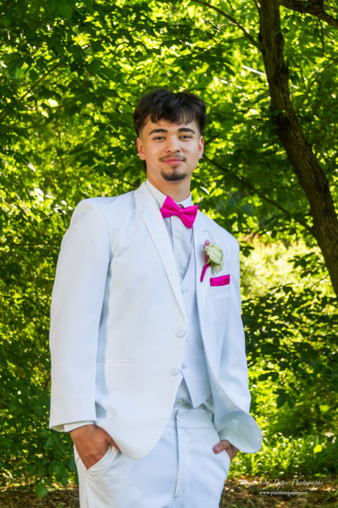 West Wilkes High School couple Valek and Sailym pose during their prom photography session in Wilkes County, NC.